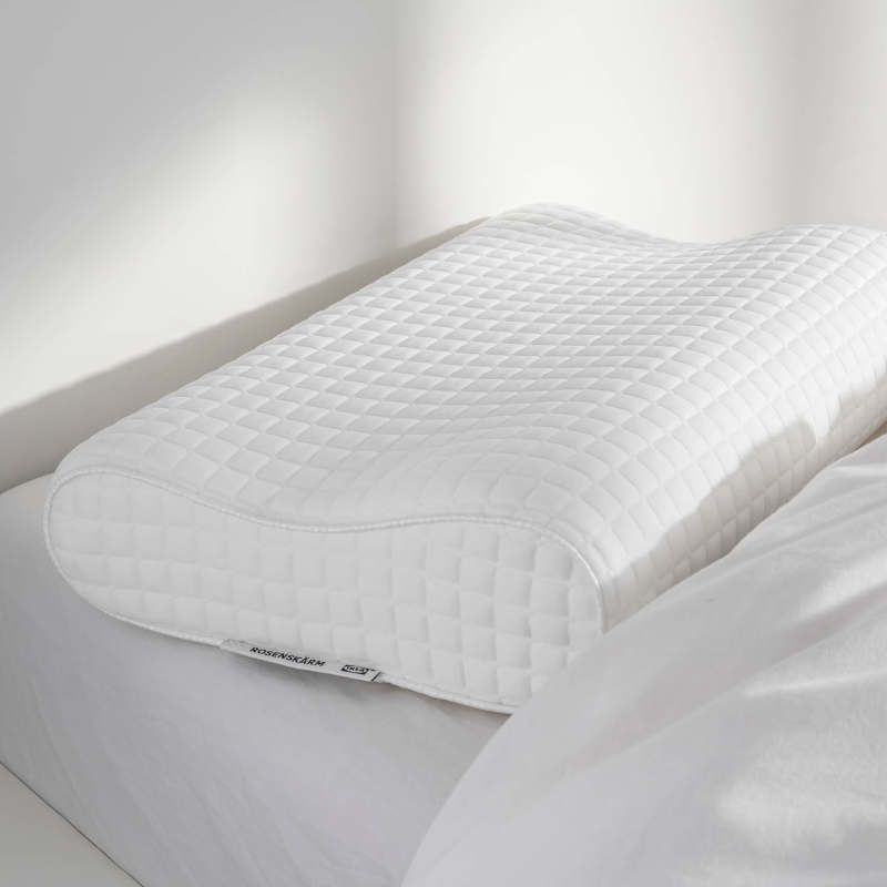 Ergonomic pillow suitable for multiple sleeping positions