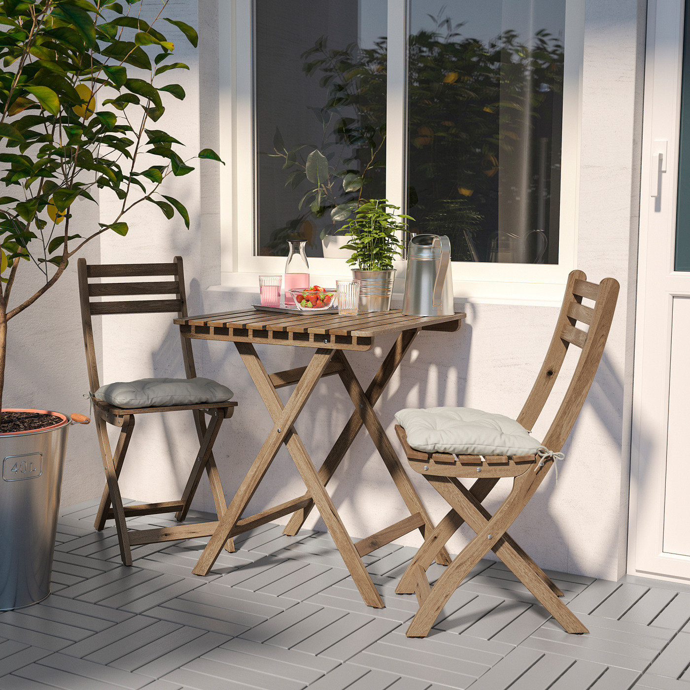 ASKHOLMEN table+2 chairs, outdoor light brown stained/Kuddarna