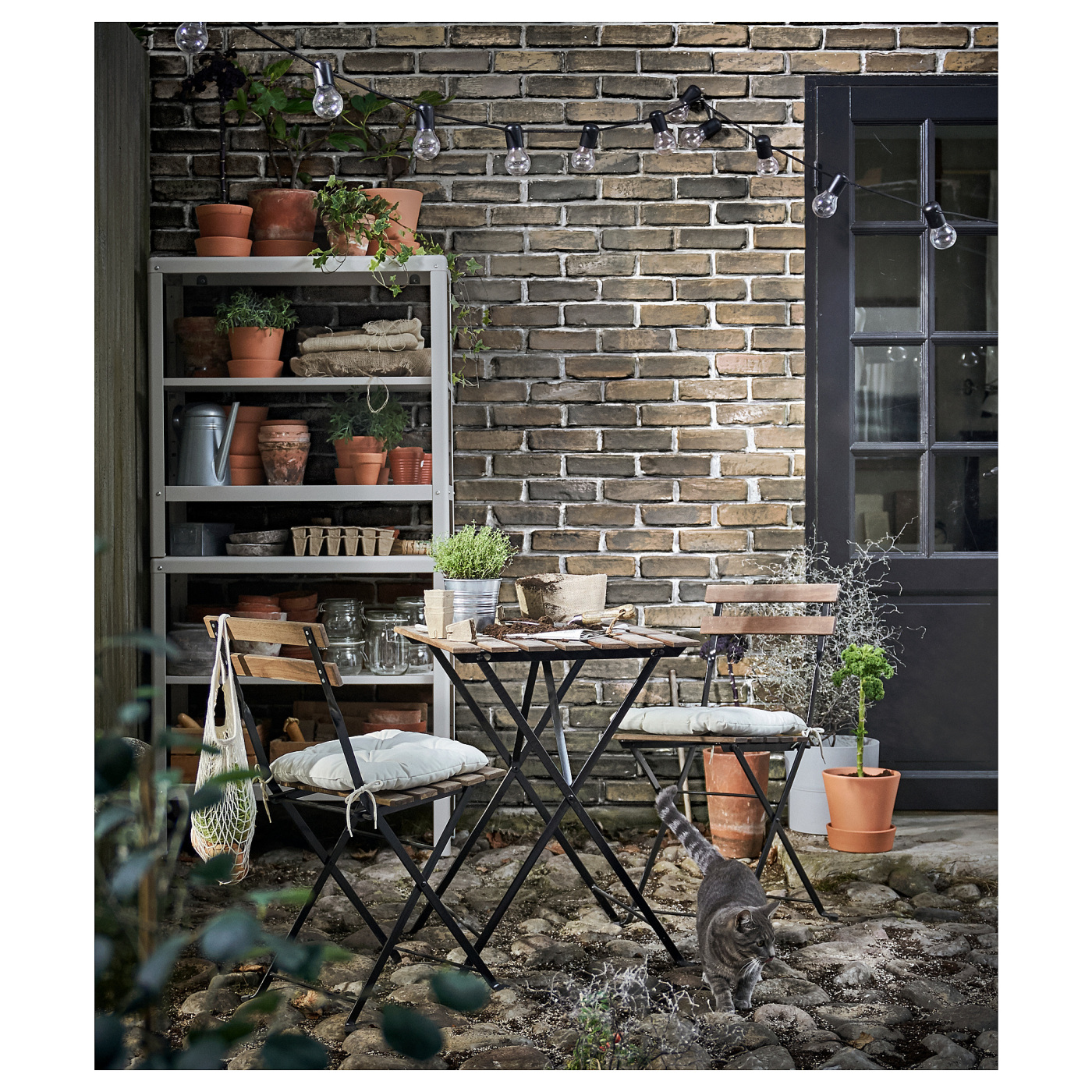 TÄRNÖ chair, outdoor foldable black/light brown stained - IKEA