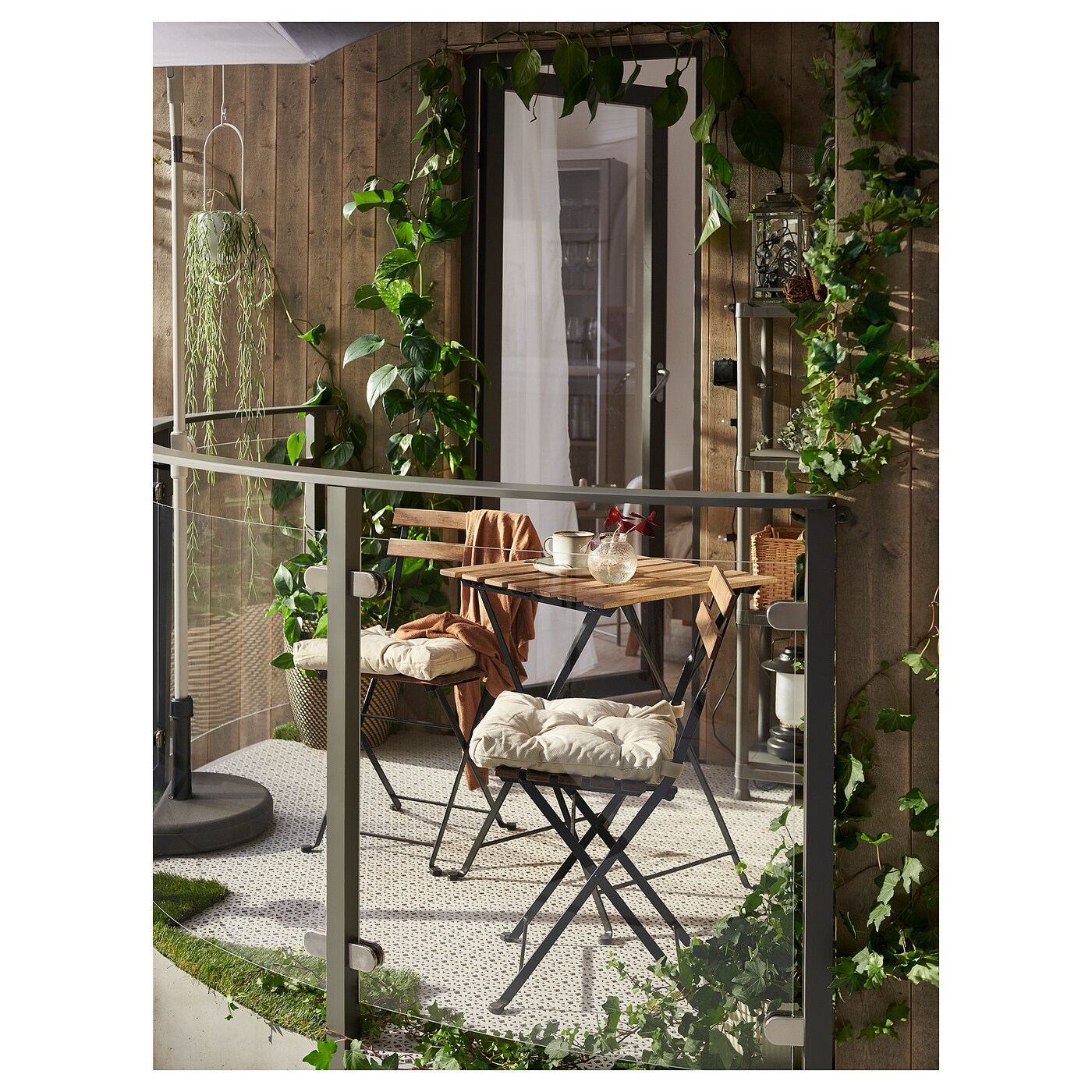 TÄRNÖ table+2 chairs, outdoor black/light brown stained/Kuddarna